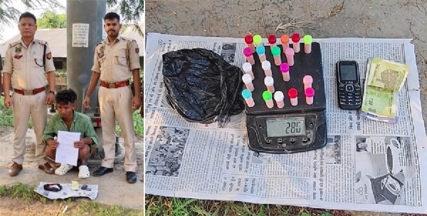 Photo of the arrested drug peddler with heroin in Guwahati.