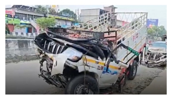 Photo Caption: The mangled remains of the pickup truck that caught fire after the crash in Jagiroad, Morigaon district, Assam.