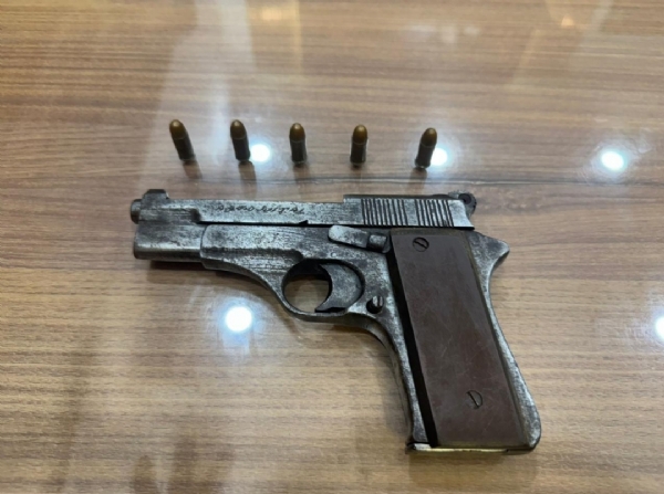 The recovered pistol and the magazines