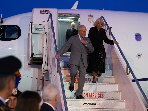 King Charles and Queen Camilla descend the steps from their aircraft after arriving in Italy King Charles and Queen Camilla descend the steps from their aircraft after arriving in Italy