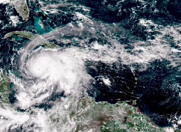 Hurricane Melissa churns northwest through the Caribbean Sea on Monday. Hurricane Melissa churns northwest through the Caribbean Sea on Monday.