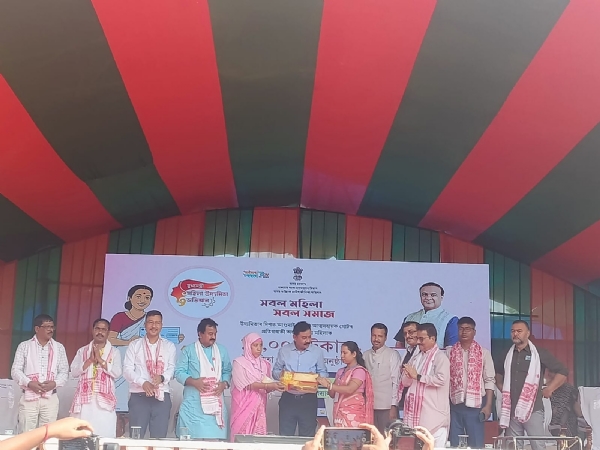 Image of the CM’s Mahila Udyamita Scheme cheque distribution in Dhubri. Image of the CM’s Mahila Udyamita Scheme cheque distribution in Dhubri.