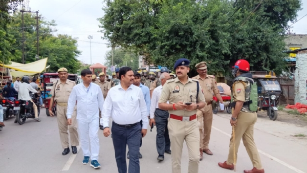 DM, SP conducts flag march in view of Durga idol immersion and Alvida Juma prayer