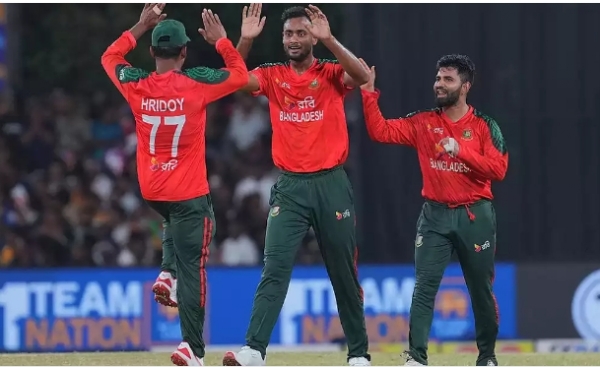 Celebrating enthusiastically, Shoriful Islam savours the moment after taking a wicket.