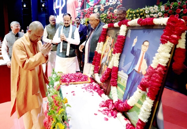 Yoffered flowers to the portraits of Bharat Mata and Babasaheb Bhimrao Ambedkar