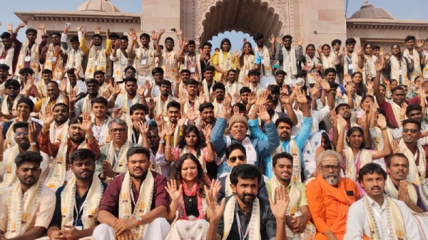 Group posed for a group photo with full faith