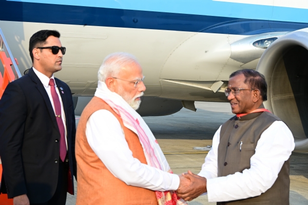 Governor Laxman Prasad Acharya Receiving PM Narendra  Modi at Guwahati Airport.