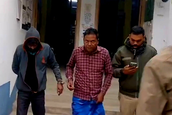 The accused with the police