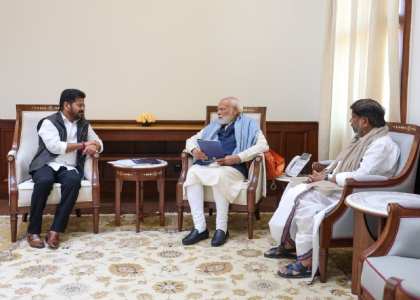PM Narendra Modi with Telangana CM Revanth Reddy