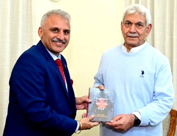 Maj Gen Ranjan Mahajan presents his book to LG Maj Gen Ranjan Mahajan presents his book to LG
