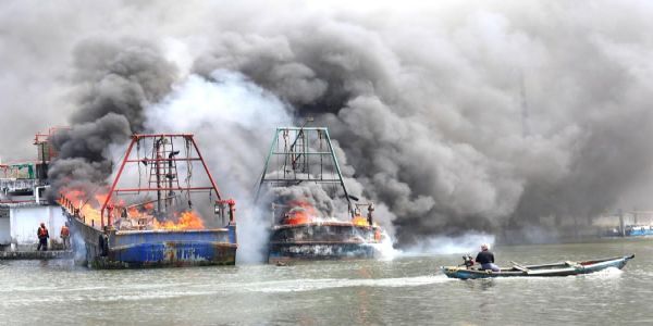 Pre-Dawn fire guts ten fishing boats in Kollam,Kerala