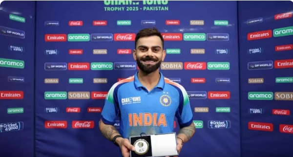 Virat Kohli with the Player of the Match award