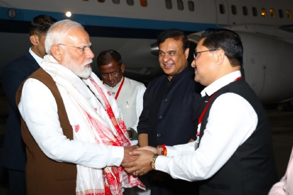 Assam state BJP President Dilip Saikia welcoming Prime Minister Narendra Modi.