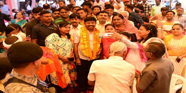 UP Minister Nandi meets party workers during Holi Milan celebrations, applying abir gulal