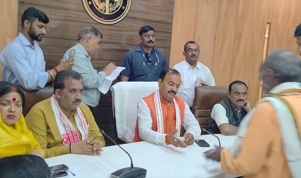 Deputy Chief Minister Keshav Prasad Maurya holding Janta Durbar
