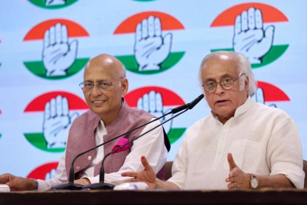 New Delhi: Abhishek Manu Singhvi and Jairam Ramesh addressing a press conference at the Congress headquarters located at 24 Akbar Road on Wednesday. New Delhi: Abhishek Manu Singhvi and Jairam Ramesh addressing a press conference at the Congress headquarters located at 24 Akbar Road on Wednesday.