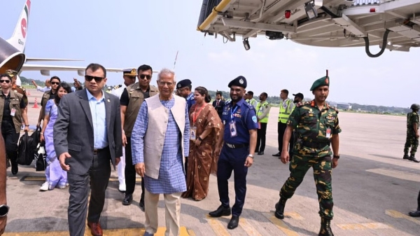 Chief Adviser Dr. Mohammad Yunus with his colleagues at Shah Amanat International Airport in Chittagong.