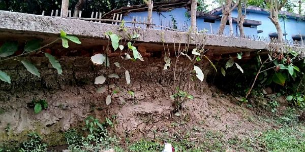 Soil beneath road caves in, villagers forced to travel risking their lives