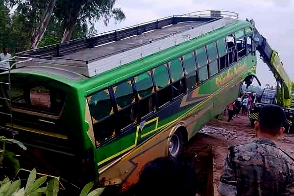Bus overturns in ditch, female passenger killed