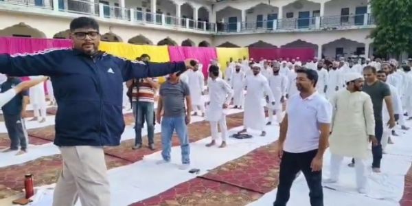 Minister of State for Minority Affairs Danish performs yoga at Darul Uloom Warsiya Madrasa