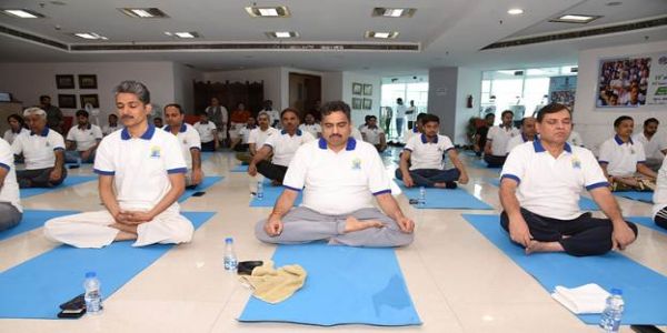 11th International Day of Yoga celebrated at National Media Centre