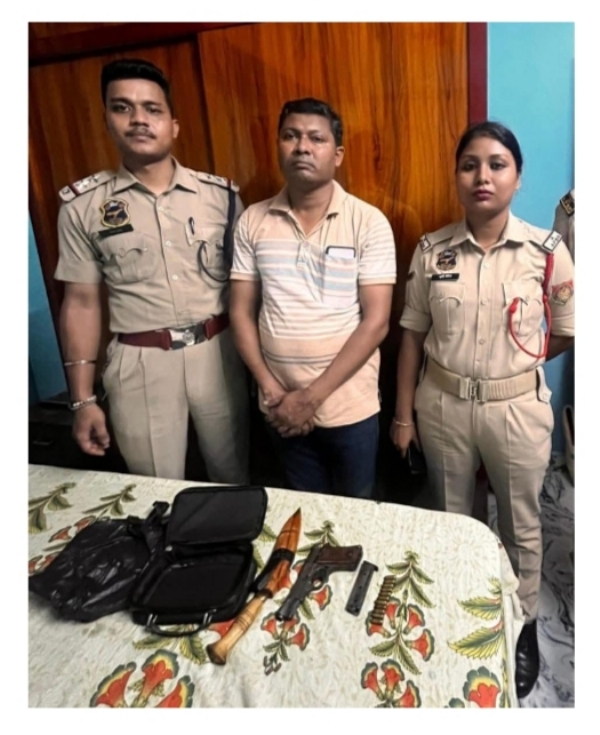 Image of the accused arrested with a pistol in Guwahati.