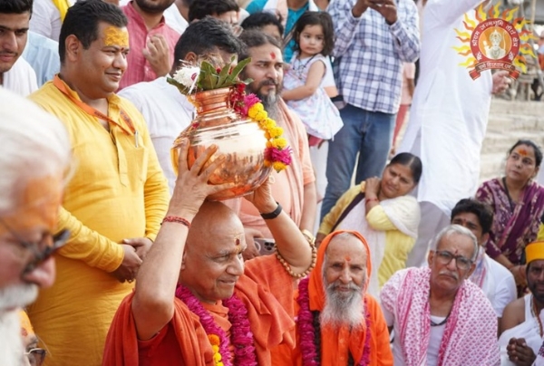 On the eve of the consecration of the eight temples at the Shri Ram Janmabhoomi complex, a sacred pot procession was organized from the holy banks of the Saryu River in the presence of revered saints, scholars, trustees of the Shri Ram Janmabhoomi Teerth Kshetra, enlightened citizens, and a large gathering of people. Photo from the official X handle of Shri Ram Janmabhoomi Teerth Kshetra. On the eve of the consecration of the eight temples at the Shri Ram Janmabhoomi complex, a sacred pot procession was organized from the holy banks of the Saryu River in the presence of revered saints, scholars, trustees of the Shri Ram Janmabhoomi Teerth Kshetra, enlightened citizens, and a large gathering of people. Photo from the official X handle of Shri Ram Janmabhoomi Teerth Kshetra.
