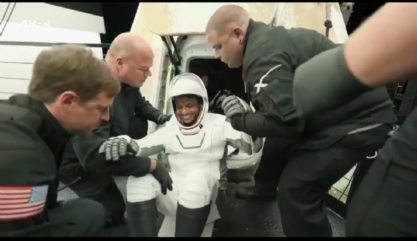 Astronaut Shubhanshu Shukla waves after reaching Earth with other crew members of the mission aboard the Dragon spacecraft that splashed down off California.