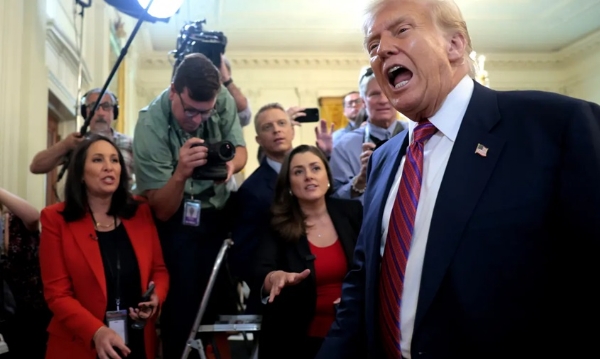 U.S. President Donald J. Trump met with reporters at a ceremony in the East Room of the White House on July 18.