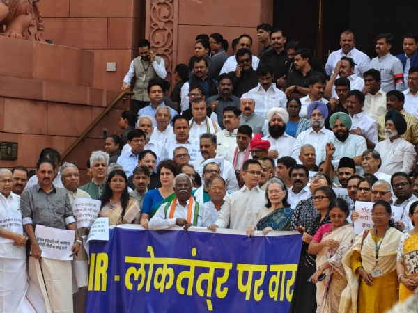 Opposition party MPs protesting against the SIR in the Parliament House.