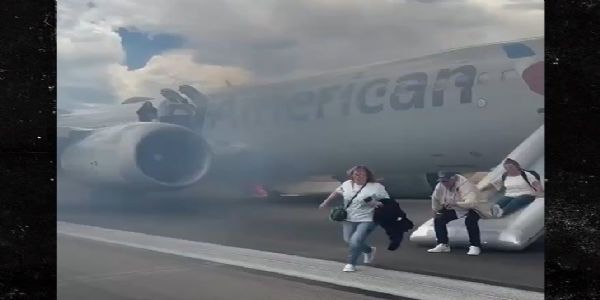 American Airlines passengers evacuate from smoky plane in Denver