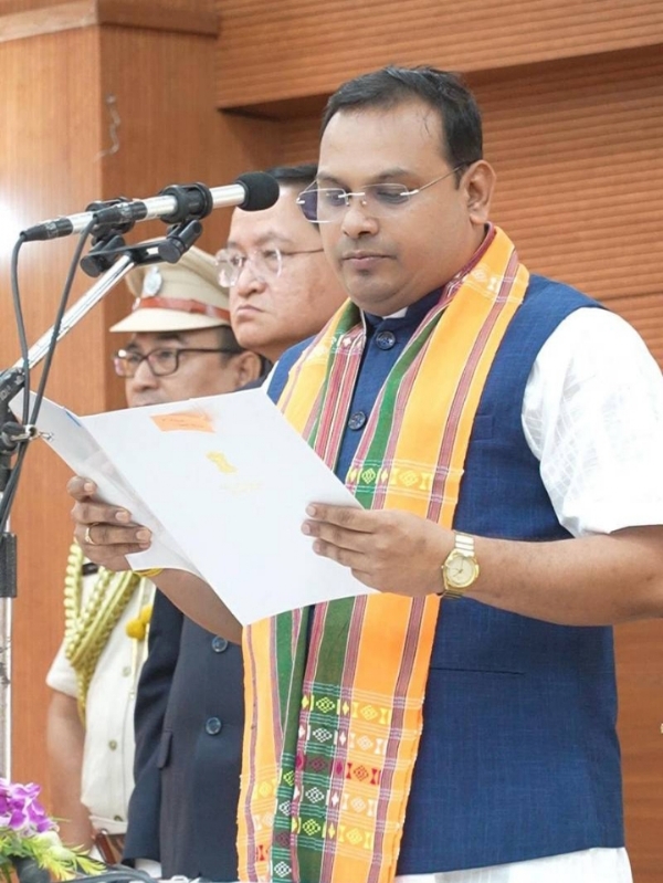Kishor Barman swornig in as Tripura Cabinet Minister.