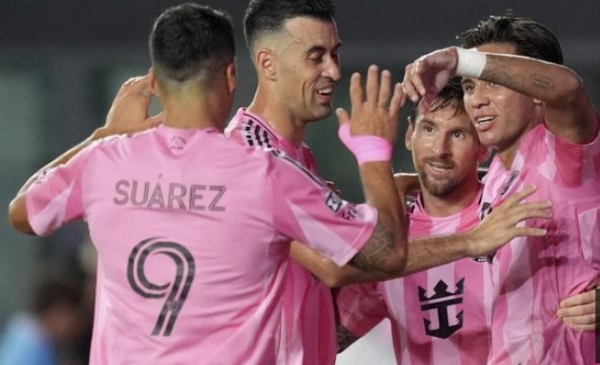 Inter Miami midfielder Telasco Segovia celebrates the second goal with right forward Messi and midfielder Sergio Busquets.
