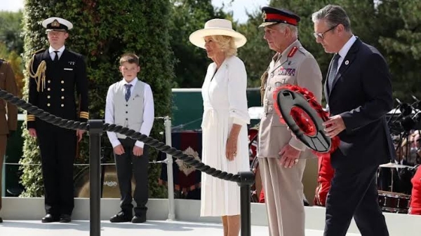 Sir Keir Starmer laid a wreath as the King and Queen looked on.