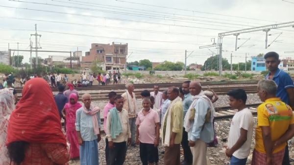 A crowd of villagers gathered on the spot