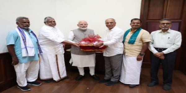 PM Modi meets group of farmers from Tamil Nadu in Parliament