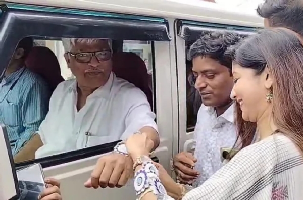 Trinamool MLA Lovely Maitra ties Rakhi to Left leader Sujan Chakraborty