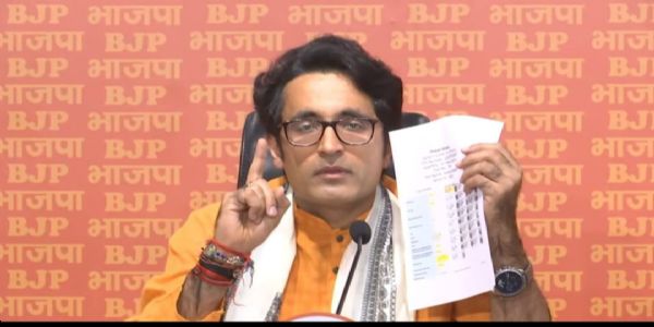 BJP Alleges Congress Media Chairman Pawan Khera Holds Two Voter ID Cards