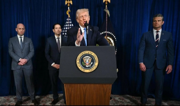 US President Donald Trump, alongside (L/R) Deputy Chief of Staff Stephen Miller, Secretary of State Marco Rubio, and US Secretary of Defense Pete Hegseth, speaks to the press following US military actions in Venezuela, at his Mar-a-Lago residence in Palm Beach, Florida, on January 3, 2026. President Trump said Saturday that US forces had captured Venezuelan leader Nicolas Maduro after launching a large scale strike on the South American country