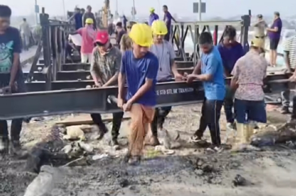 BRO personnel removing a Bailey bridge.
