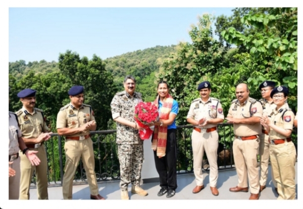 Assam Police DGP Harmit Singh Felicitating Asian Games Gold Medallist Lovlina Borgohain. Assam Police DGP Harmit Singh Felicitating Asian Games Gold Medallist Lovlina Borgohain.