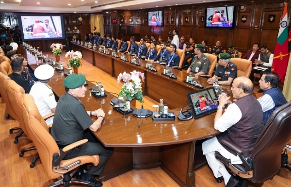 Defence Minister Rajnath Singh interacting with Armed Forces athletes participating in the Asian Games.