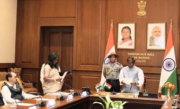 Governor Lakshman Prasad Acharya Administering Oath to Dr Madhumita Baruah as Assam Women’s University Vice Chancellor.
