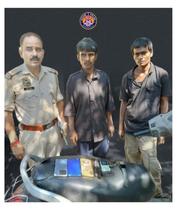 Image of the Two Arrested Accused in Theft Case in Guwahati, Stolen Mobiles and Scooty Seized.