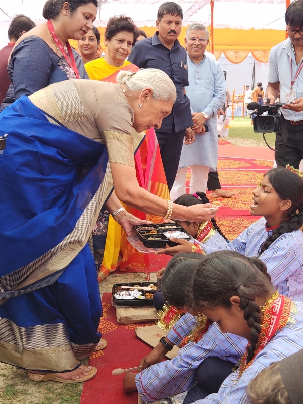 Anandiben Patel, worshipped the girls, fed them, and presented them with chunri (scarf) and dakshina (gift) Anandiben Patel, worshipped the girls, fed them, and presented them with chunri (scarf) and dakshina (gift)