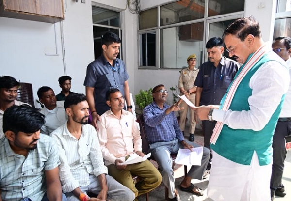 Deputy Chief Minister Keshav Prasad Maurya holding Janta Darshan