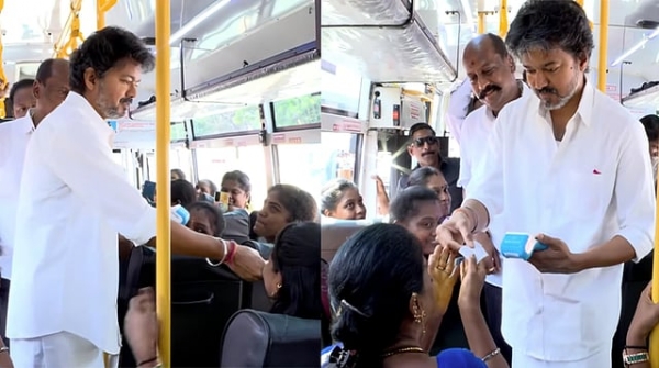Vijay issuing free tkt to women in buses Vijay issuing free tkt to women in buses