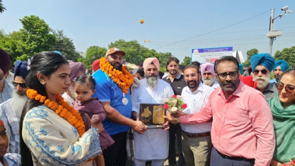 MLA Gurlal Ghanour Welcoming the OlympianDSP Tajinderpal Singh Toor