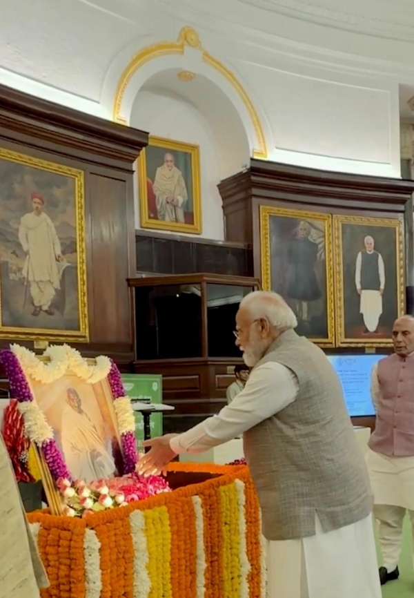 Prime Minister Narendra Modi pays floral tribute to the portraits of Father of the Nation Mahatma Gandhi and former Prime Minister, the late Lal Bahadur Shastri, at the Central Hall of Constitution House on the occasion of their birth anniversaries, New Delhi, October 2.