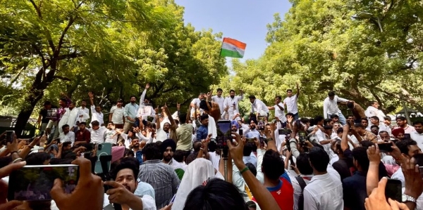 Indian Youth Congress workers stage a protest demanding the resignation of the Chief Election Commissioner.